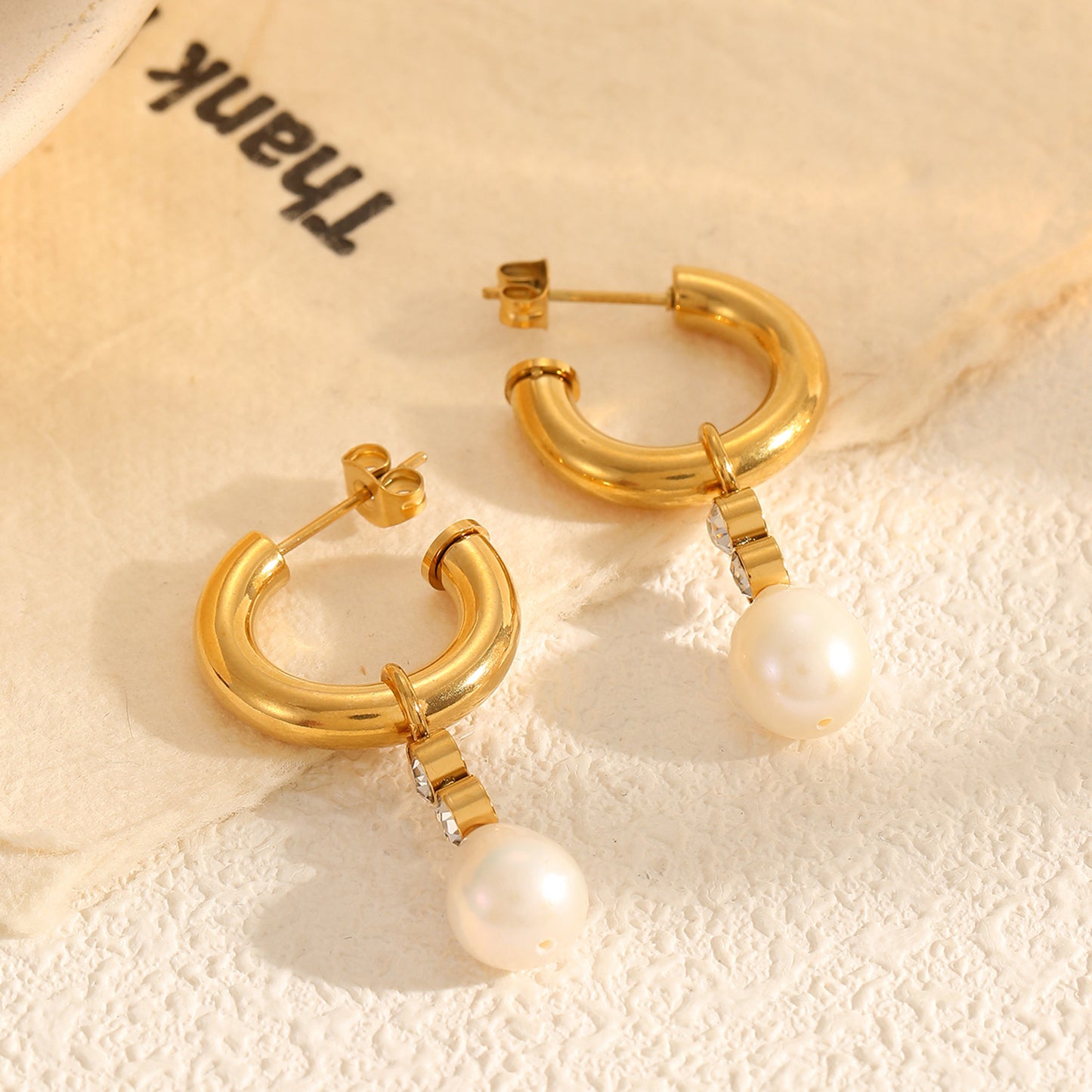 Fashionable niche light luxury temperament pearl earrings stainless steel plated 18K zircon pearl pendant earrings