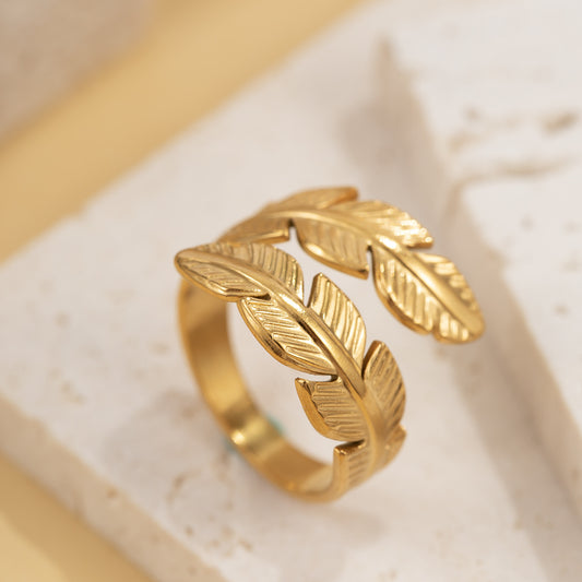 Fashionable stainless steel leaf ring for women, open design, hip-hop style, 18k gold, non-fading, cross-border jewelry.